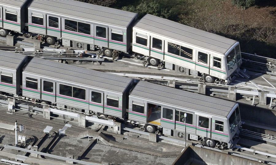 Center 2021 10 08t043345z 571853120 rc2g5q9344ie rtrmadp 3 japan quake