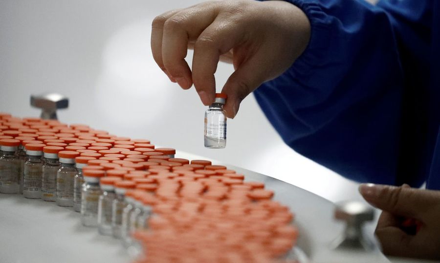 Center 2021 03 15t074053z 688270099 rc2jbm98hld2 rtrmadp 3 health coronavirus vaccine china