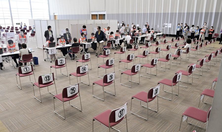 Center 2021 05 24t043044z 479358941 rc24mn9ajk9x rtrmadp 3 health coronavirus japan